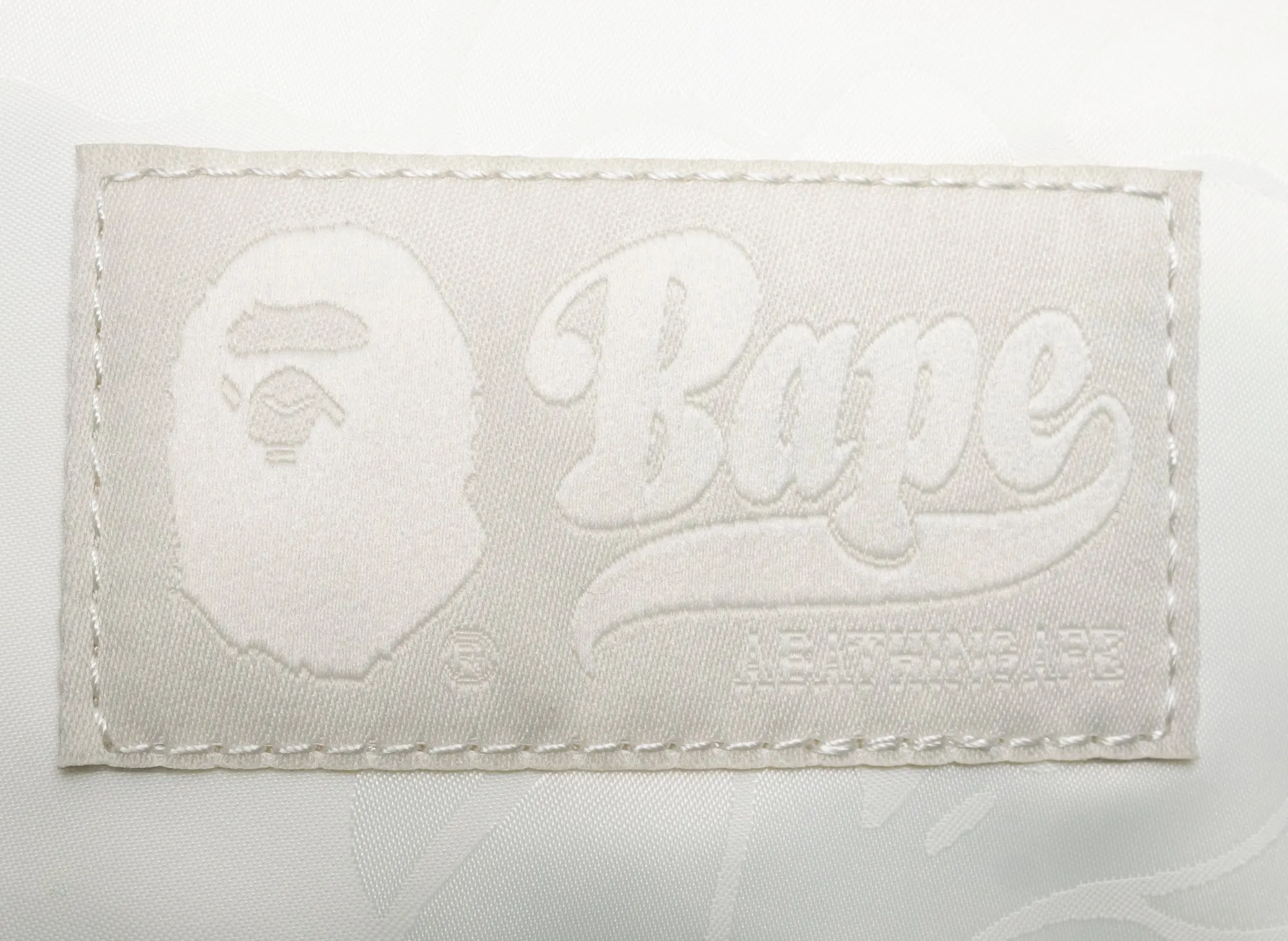 A Bathing Ape Tonal Solid Camo Waist Bag in Ivory