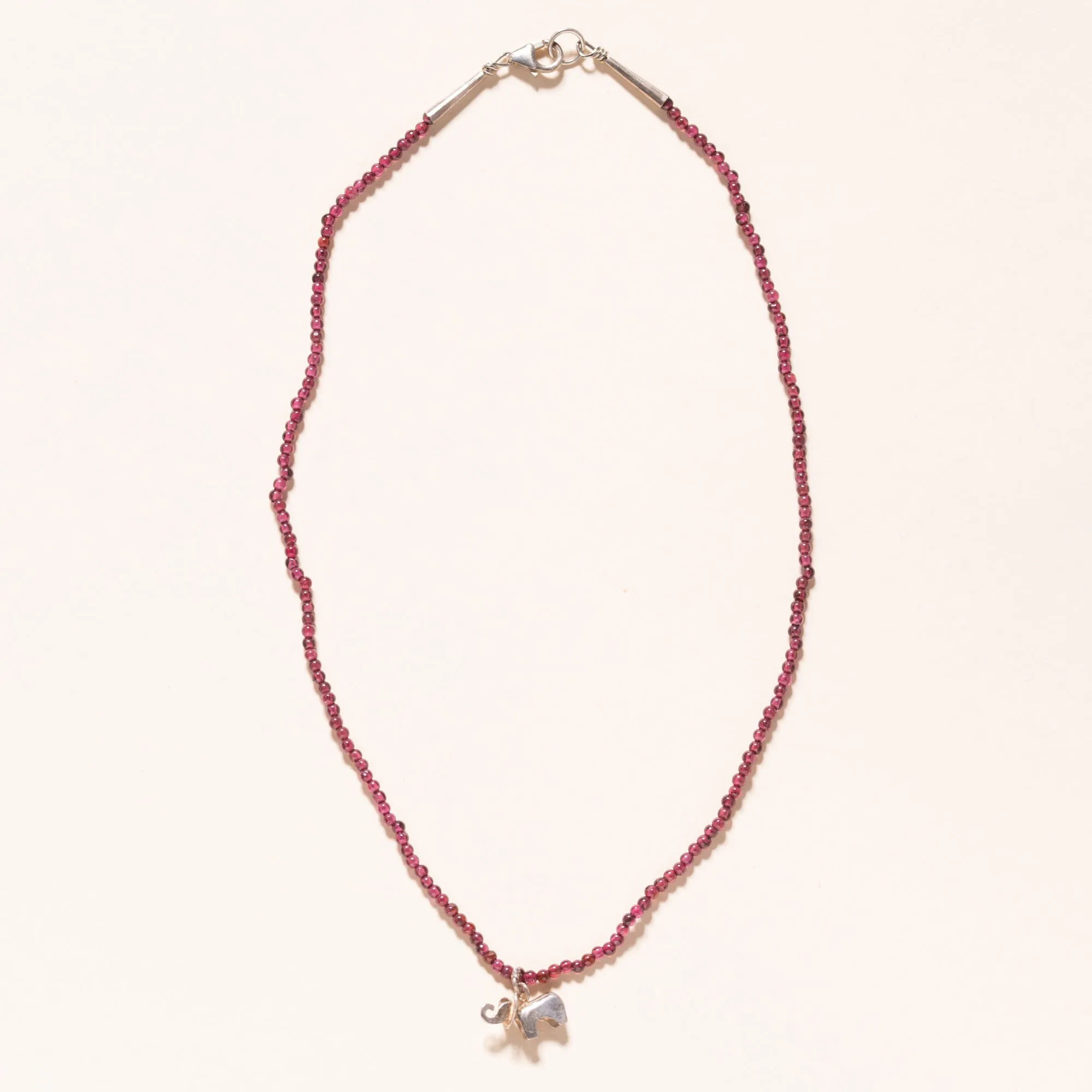 Baby Sterling Silver Isabelle on 2mm Red Garnets. 16”